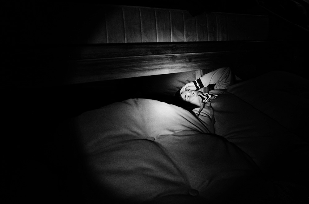 My brother under the table covered himself with matresses.-Air raid